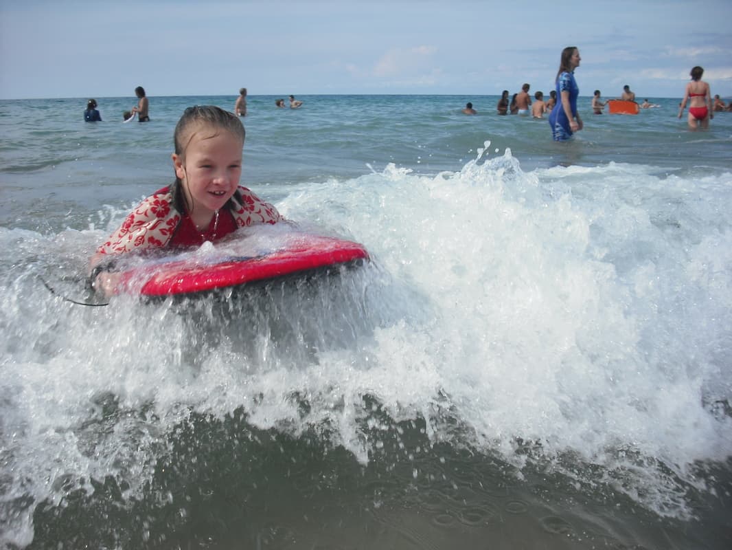 Girl boogie boarding at Hapuna Beach